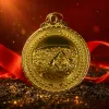 The golden circular swimmer's medal with olive branch pattern is adorned with a hanging ring Specification image